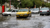 وضعیت خیابان‌های شهر ایوان بر اثر شدت بارش باران