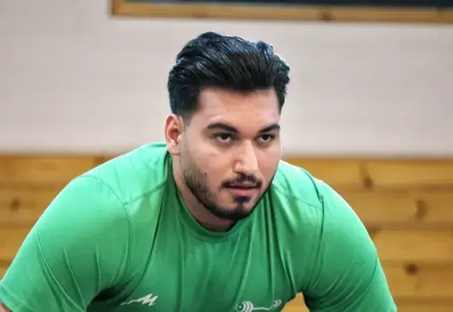 پسر ایرانی، چهارمین وزنه بردار دنیا با سنگین‌ترین مهار