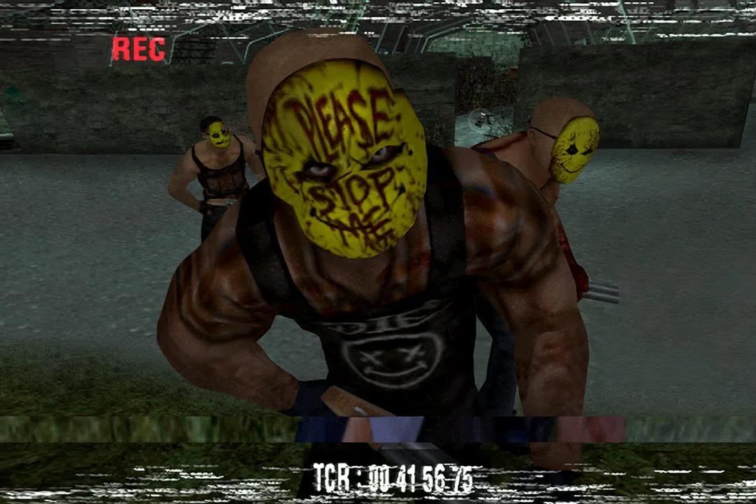 Three Muscular Figures in Yellow Masks One Foreground Man in a Black Tank Top Approaching Menacingly in a Glitchy Video game Scene with 'rec' Overlay