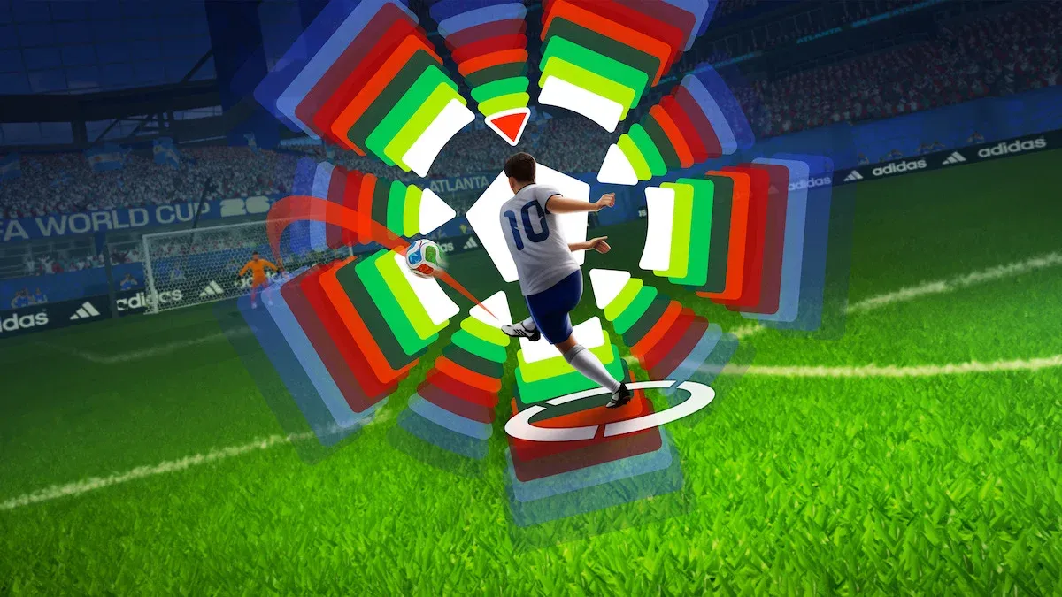Soccer Player in White and Blue Kicks a Ball Amid Colorful Concentric Rings on a Bright Green Field Stadium in Background