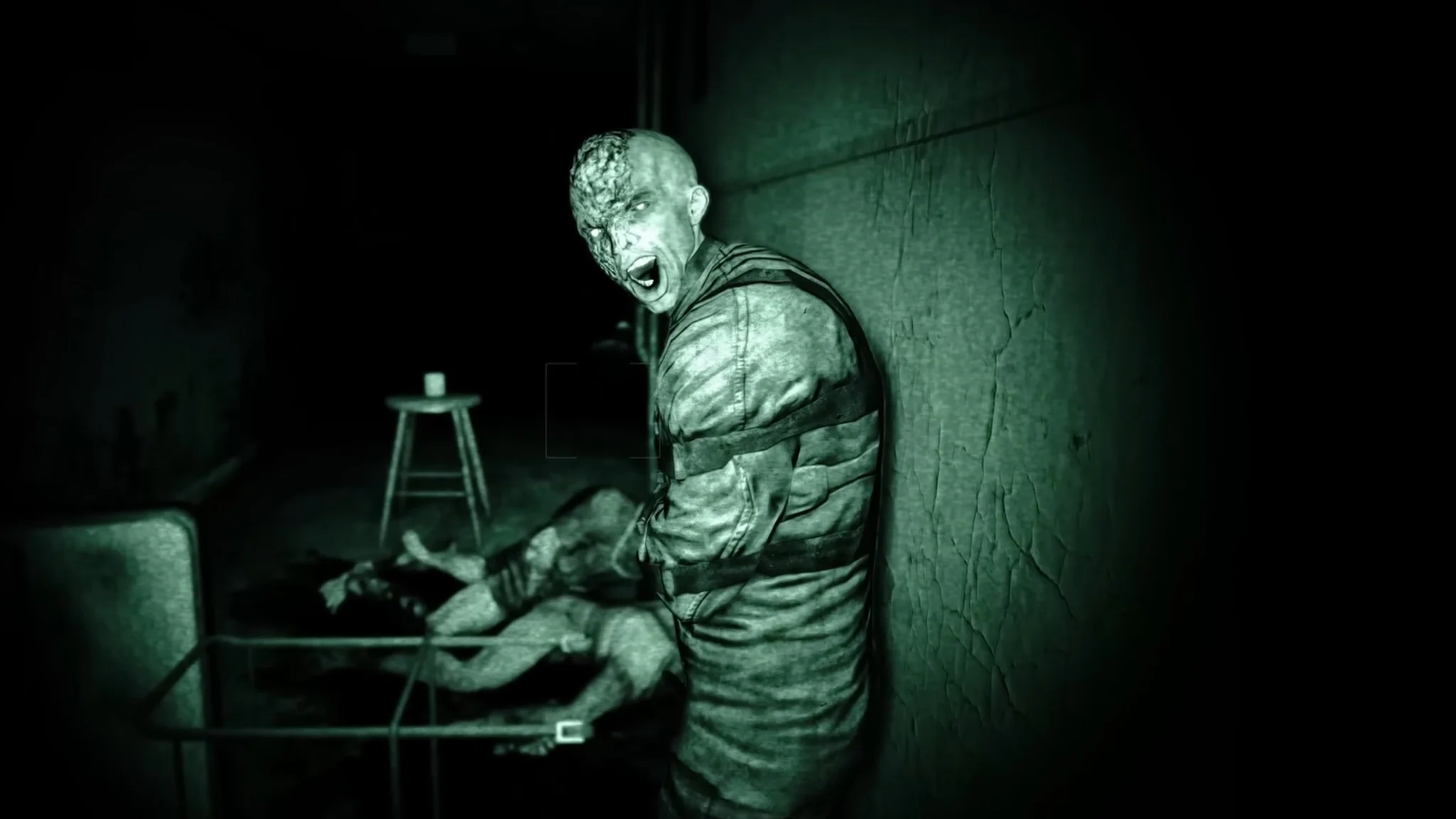 Pale Zombie Tied to a Cracked Wall in a Dark Eerie Room Green tinted Horror Scene